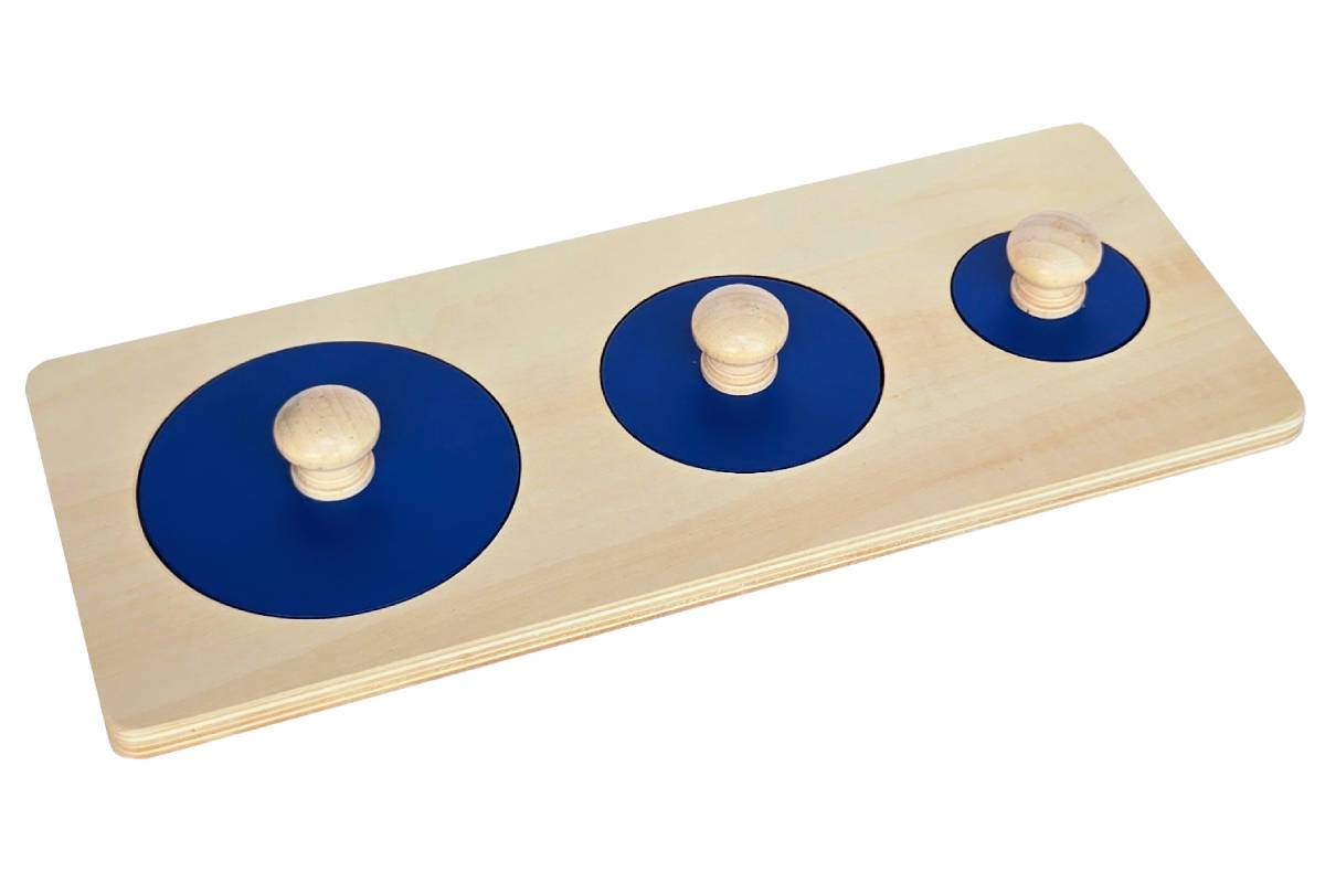 Puzzle with three blue circles in different sizes.