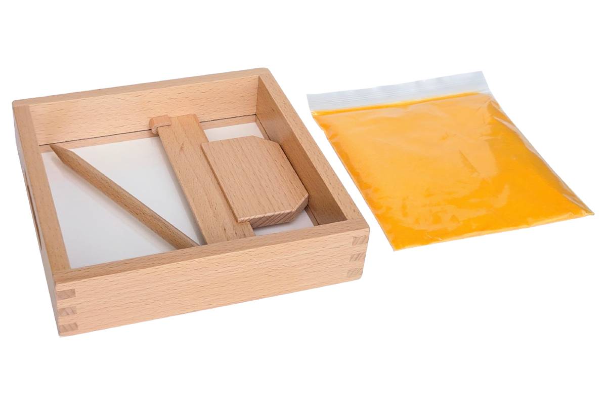 Sand tracing tray with clear plastic bottom.
