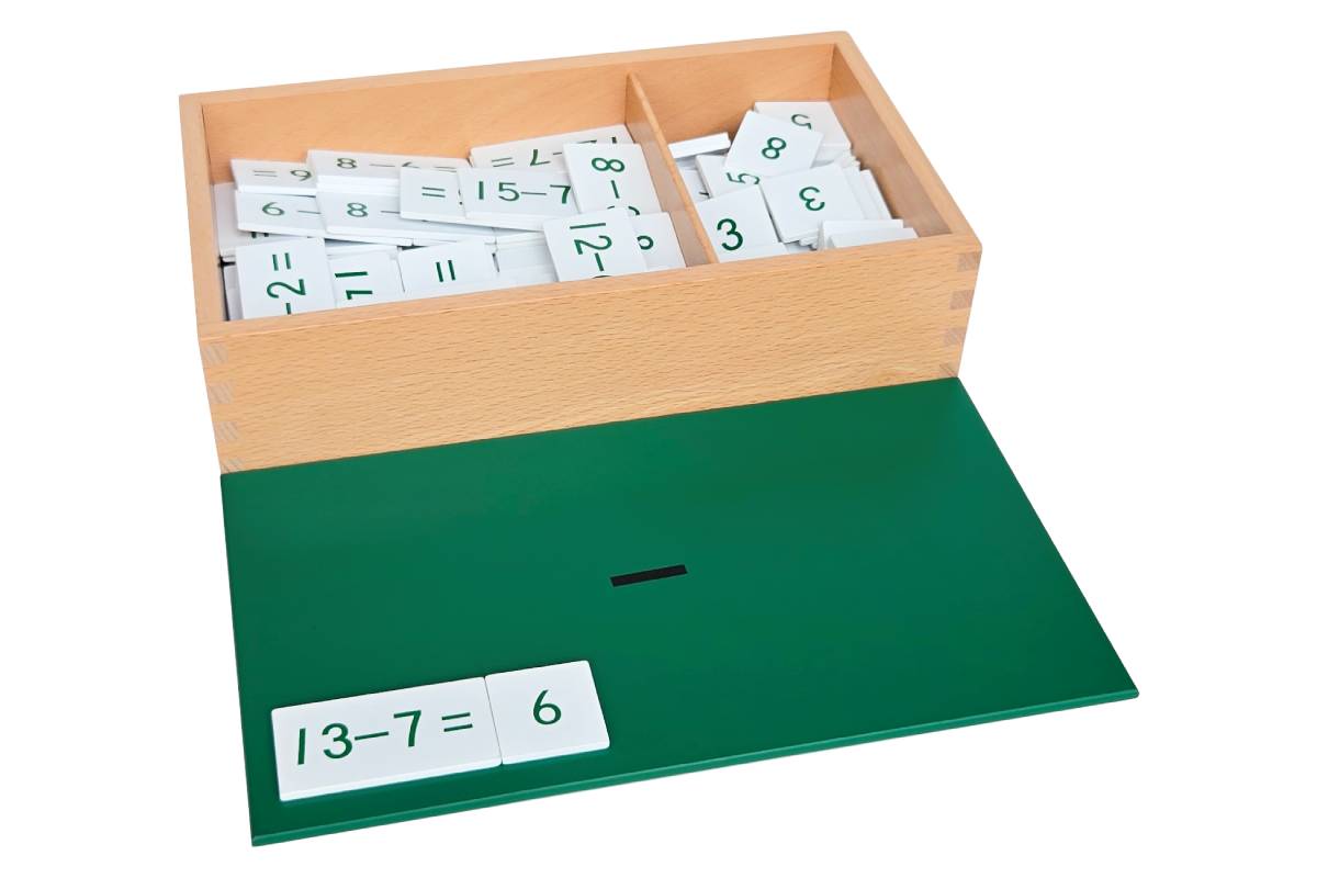 Subtraction equations and differences box with green lid printed with "-" containing white tiles with green text.