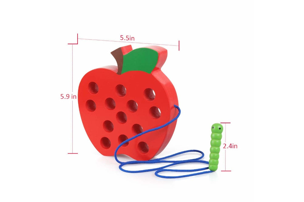 Red wooden apple with holes and a green worm attached to a string. Worm can be threaded through the holes. Apple measures 5.9 in x 5.5 in.