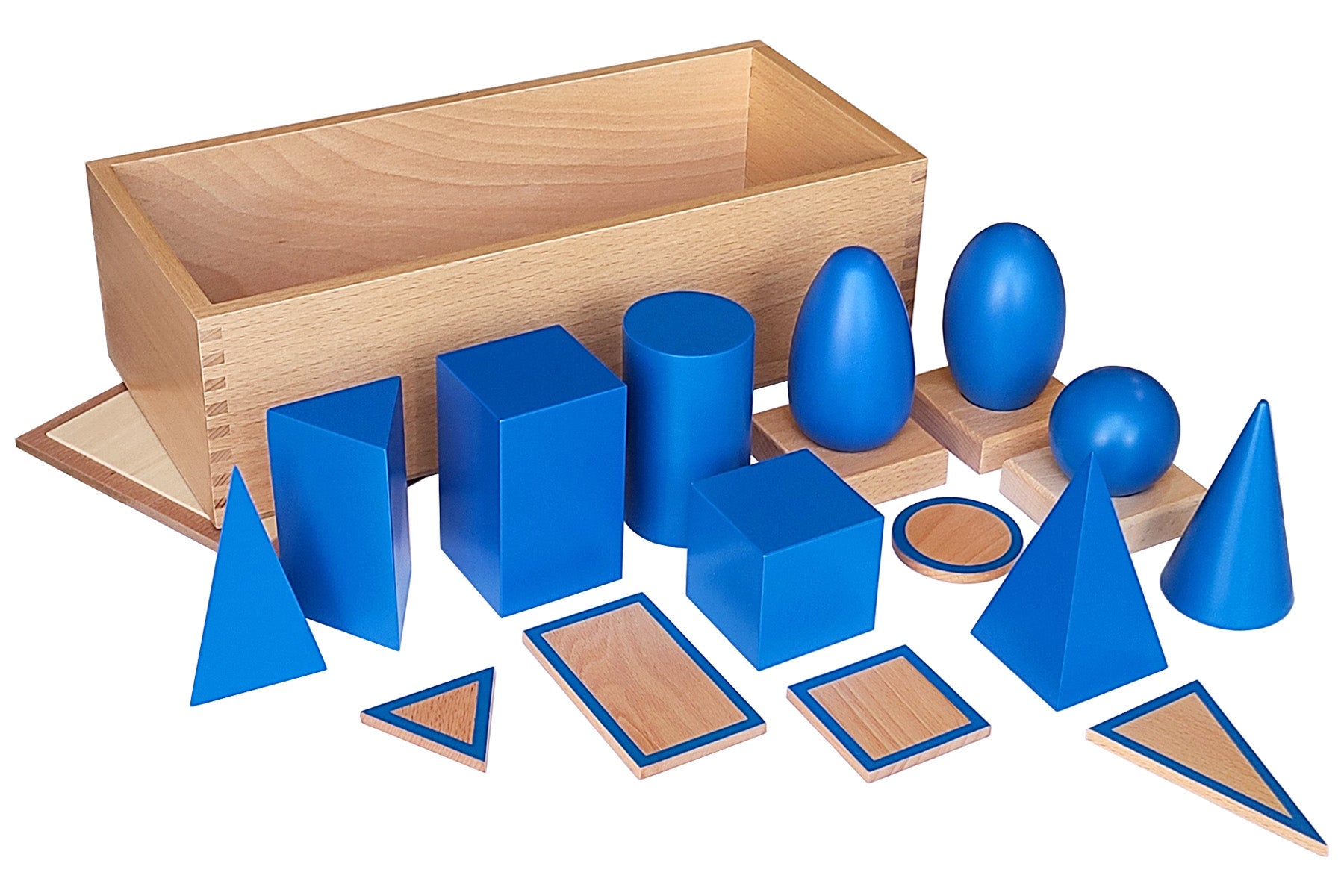Blue geometric solids with stands and bases, and a large wooden storage box.