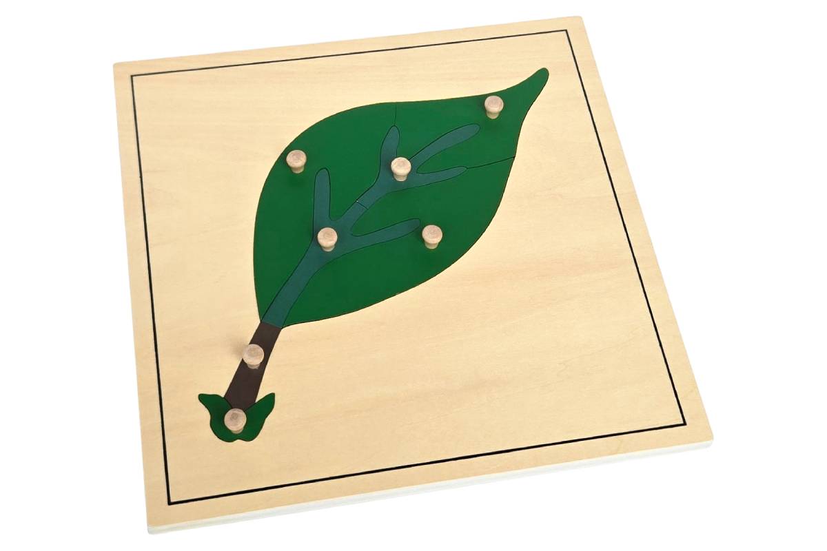 Leaf puzzle with wooden knobs.
