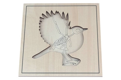 Puzzle base depicting bird skeleton.