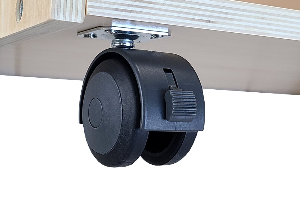 Close-up of the cabinet's black plastic wheel. Wheel has brake and can lock in place.