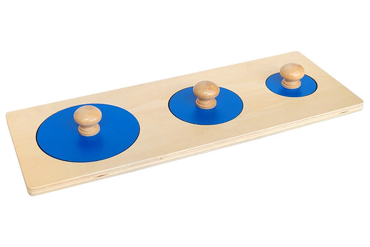 Puzzle with three blue circles in different sizes.