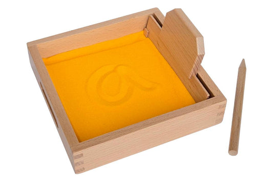 Small square sand tracing tray with smoothing tool and wooden pen.