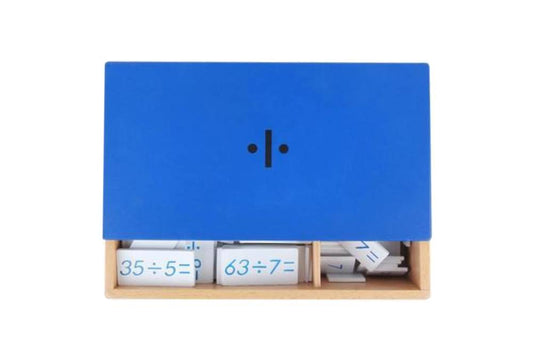 Division equations and dividends box with blue lid printed with "÷" containing white tiles with blue text.