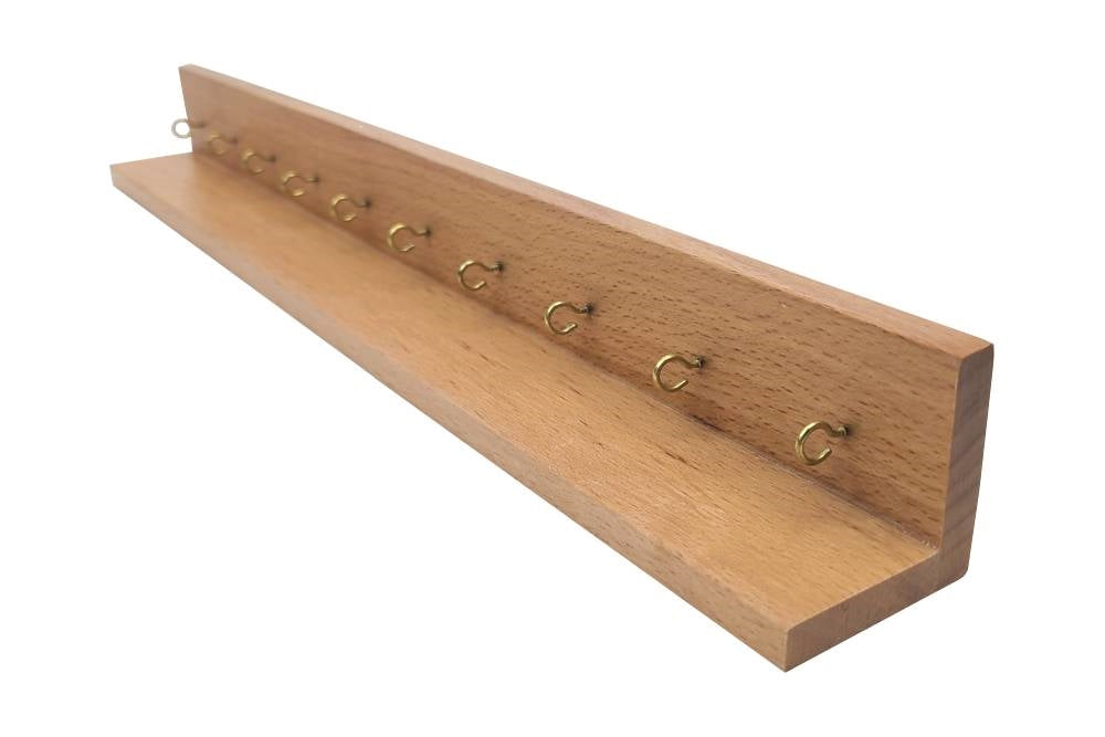 Close-up of wall frame showing the hooks.