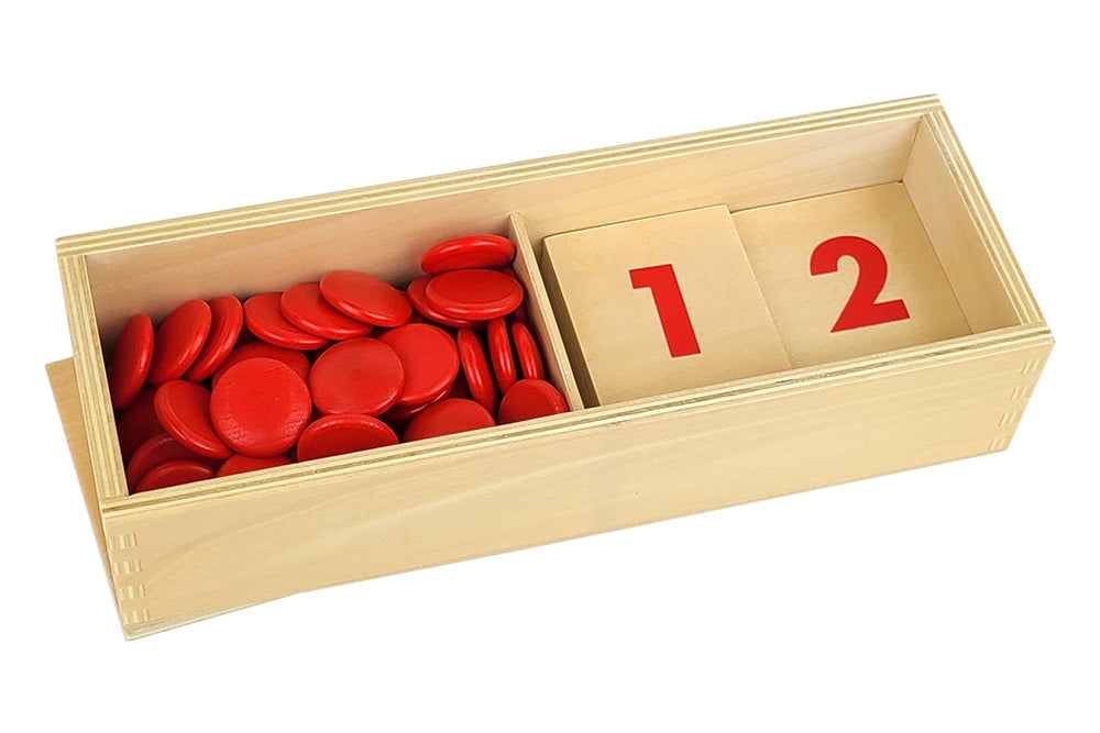 Two-compartment wooden box with red counters on the left and number cards on the right. Two cards are visible in the box: '1' and '2'.