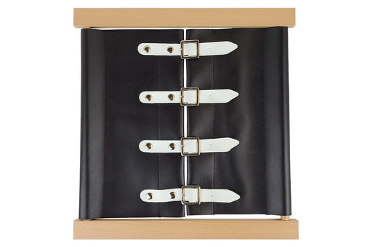 Wooden buckles dressing frame with black fabric and white straps.